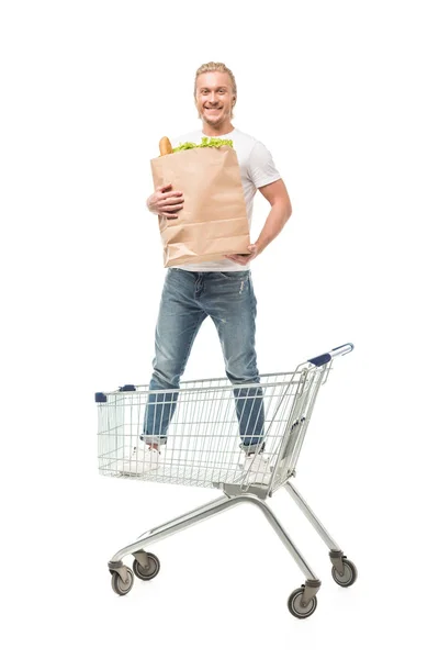 Hombre con bolsa de compras de papel - foto de stock
