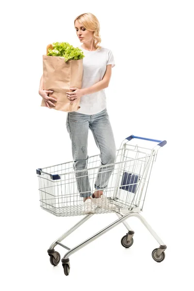 Woman with paper bag — Stock Photo