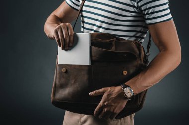 Stylish man with leather bag  clipart