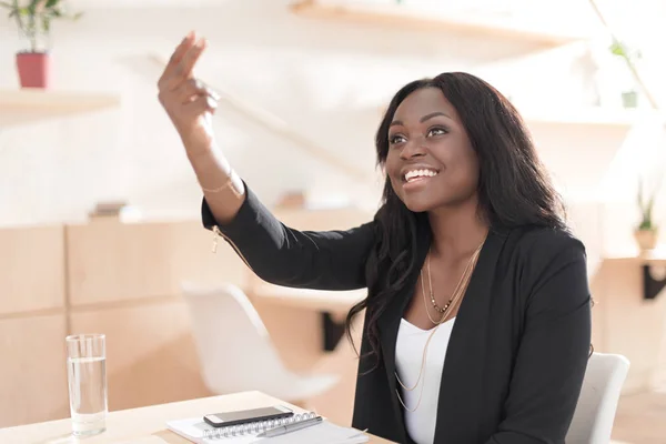 African american woman in cafe — Stock Photo, Image