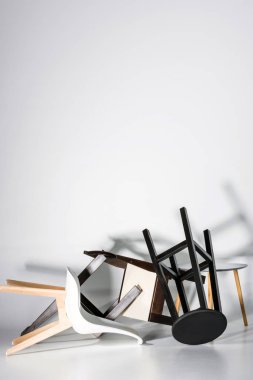 Pile of stylish chairs clipart