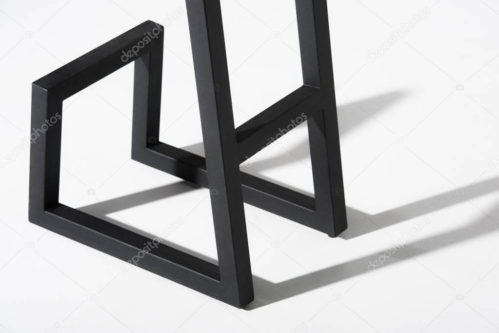 black metallic legs of stool