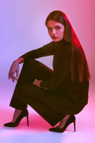 Girl posing in black clothes — Stock Photo, Image