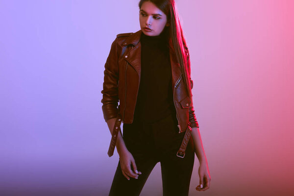 fashionable girl in leather jacket 
