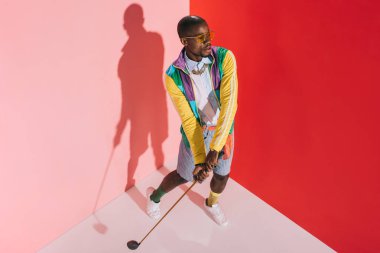 stylish man with golf club clipart