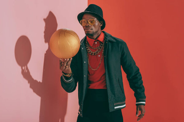 african american man with golden ball