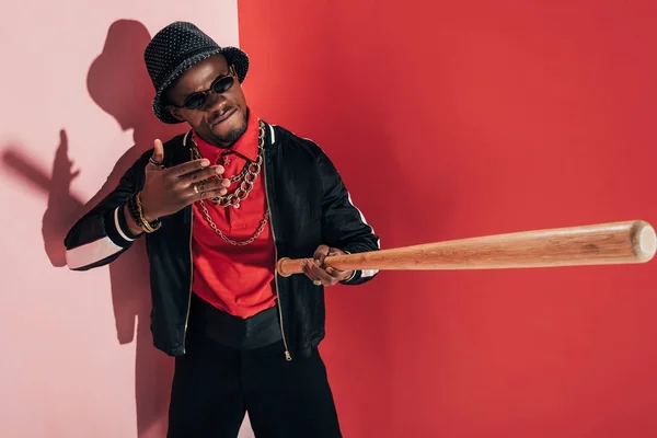 African american man with bat — Stock Photo, Image