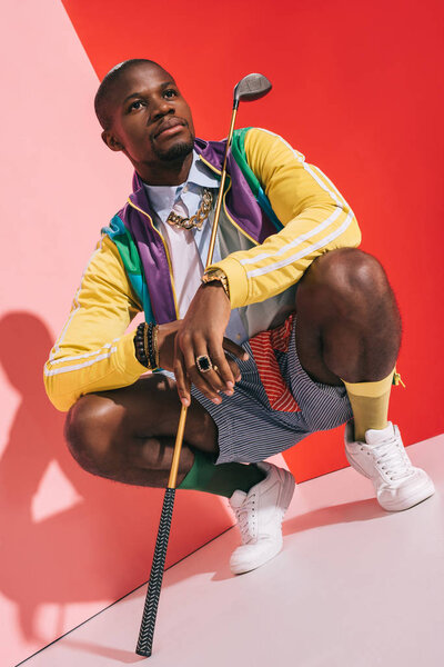 stylish man with golf club