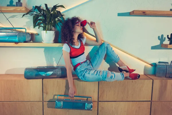 Stylish woman holding boombox — Stock Photo, Image