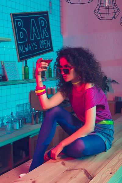 Fashionable woman with cocktail — Free Stock Photo