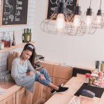 Barista sitting on counter