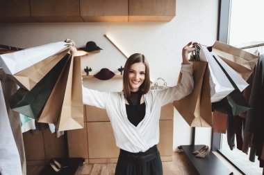 woman with shopping bags clipart