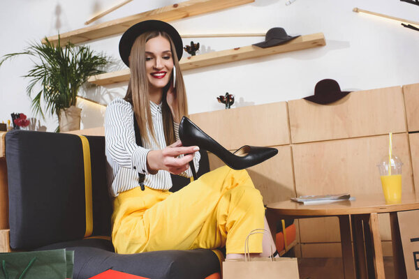 beautiful girl choosing heels 