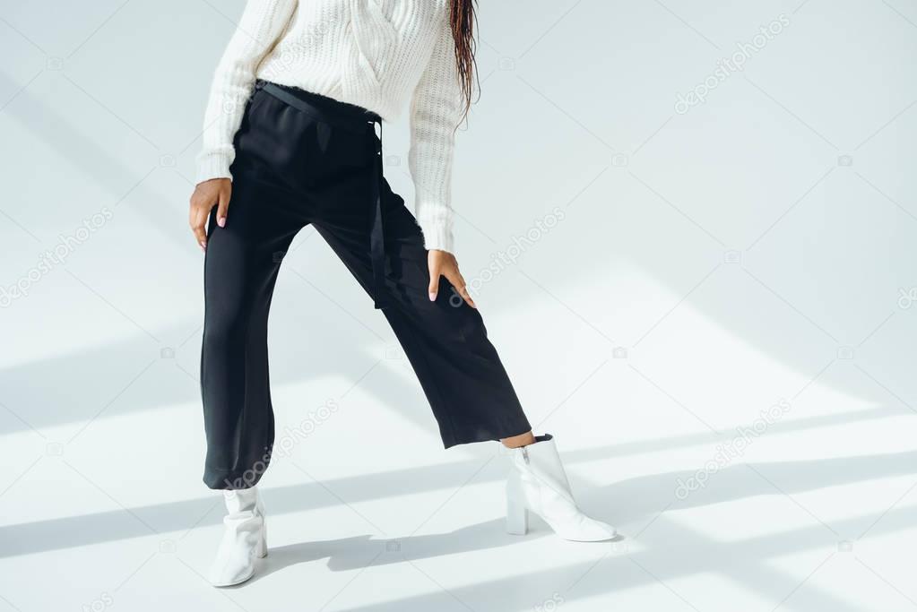 girl in trendy black pants