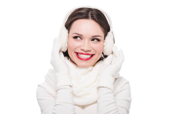 Woman with red lips in earmuffs