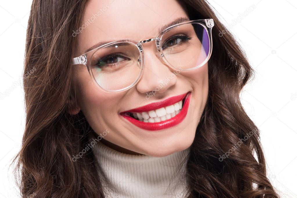 Smiling woman in clear glasses