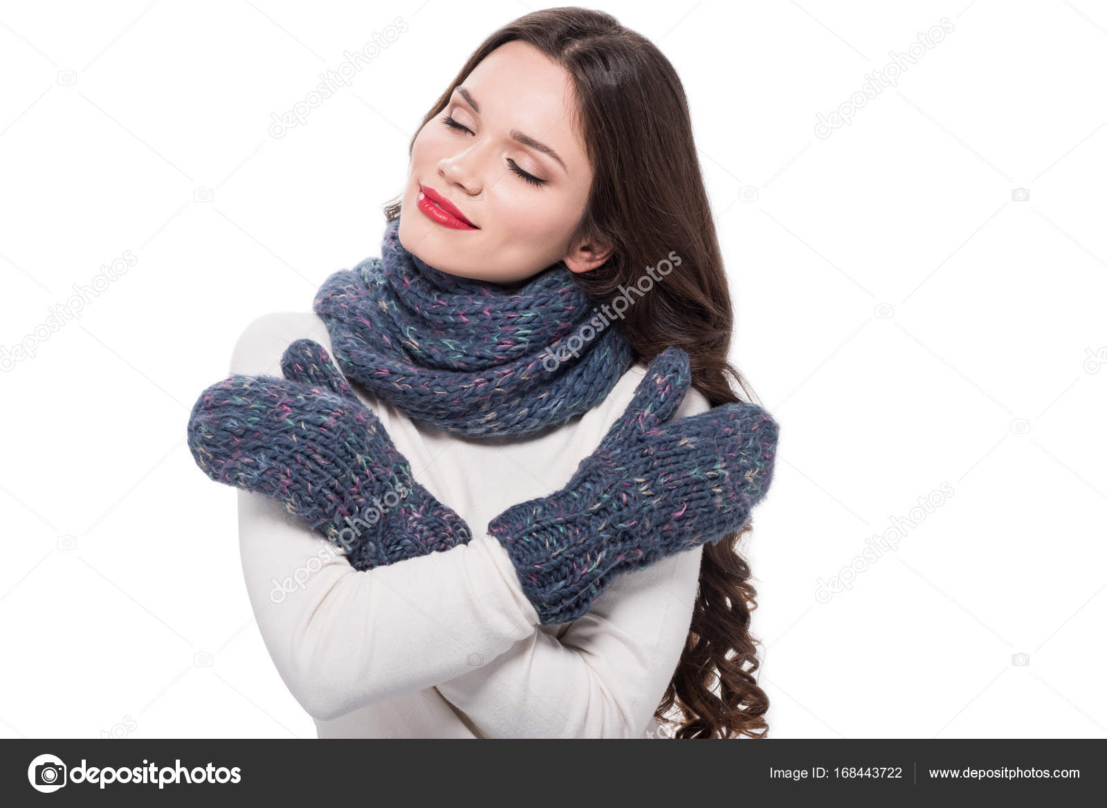 Woman in winter clothes warming up — Stock Photo © VitalikRadko 168443722