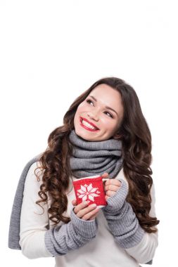 Smiling woman holding coffee mug clipart