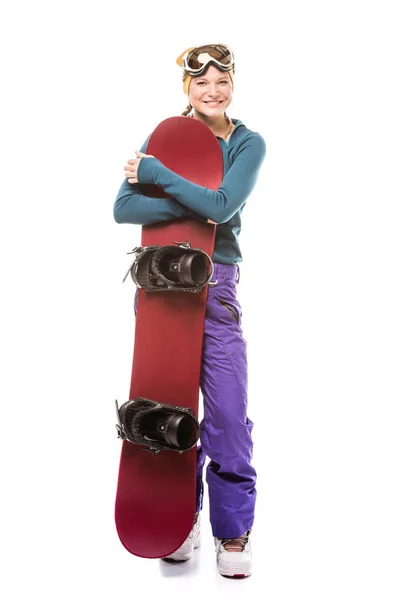 Jonge vrouw met snowboard — Stockfoto