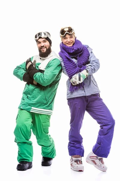 Snowboarders with arms crossed looking at camera — Free Stock Photo