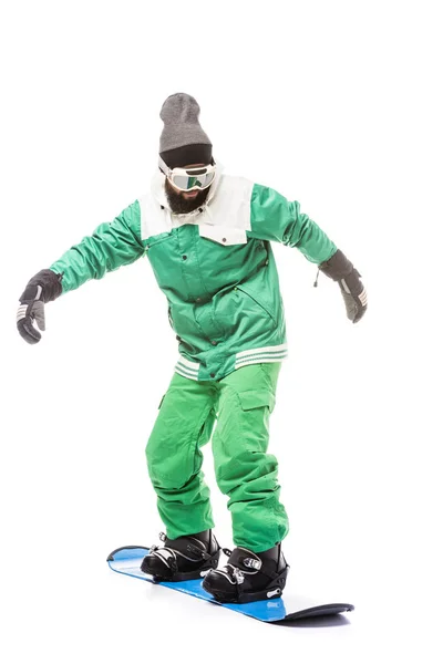 Hombre de pie sobre snowboard — Foto de stock gratis