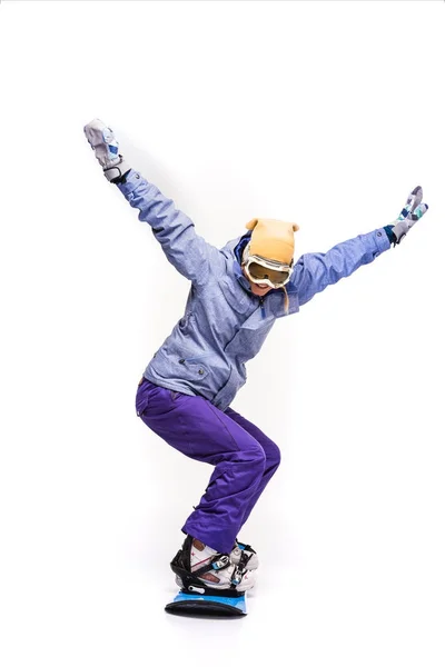 Woman sliding on snowboard — Stock Photo, Image