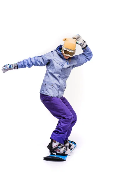 Woman sliding on snowboard — Stock Photo, Image