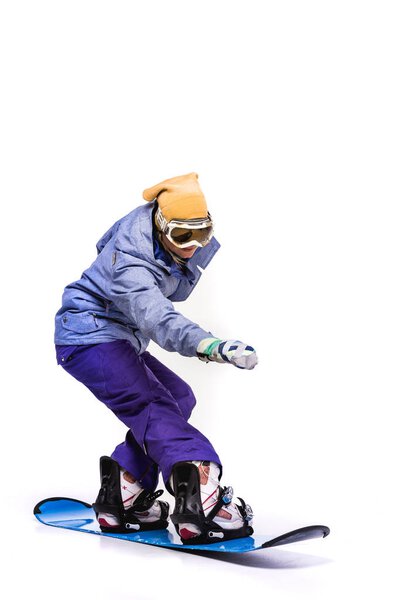 woman sliding on snowboard