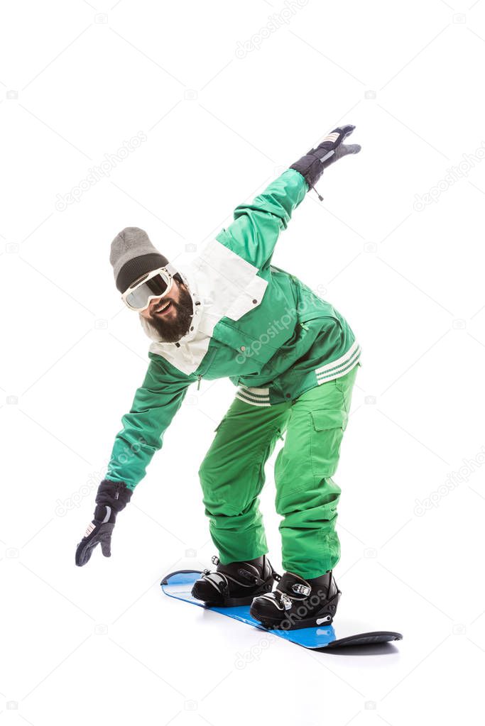 man sliding on snowboard