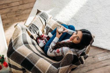 woman enjoying hot chocolate with marshmallow clipart