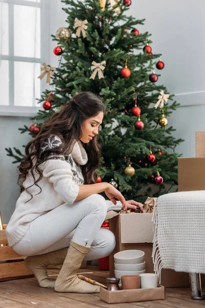 Woman with christmas decorations — Stock Photo, Image