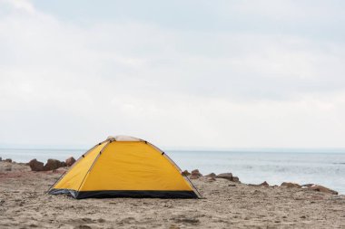 camping tent on seahore clipart