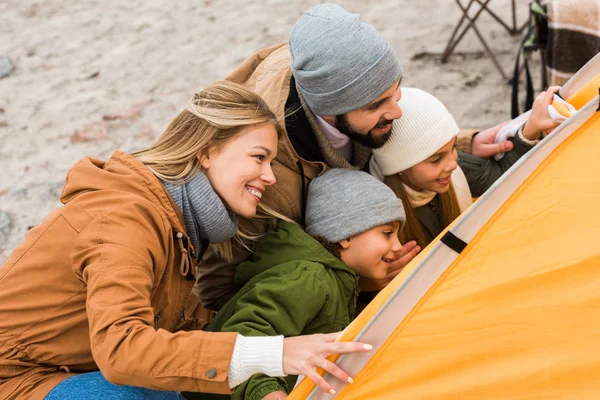 Family looking at camping tent — Stock Photo, Image