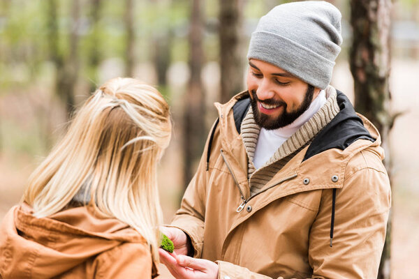 couple spending time together in forest
