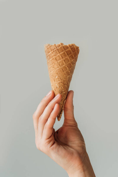 woman holding ice cream cone
