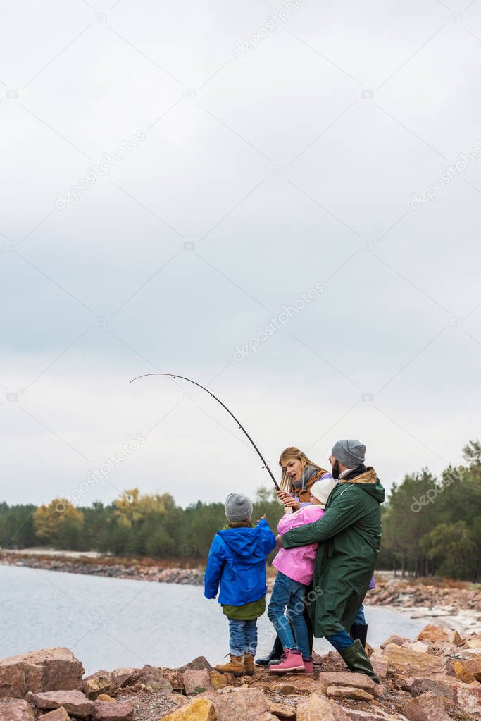 family fishing together