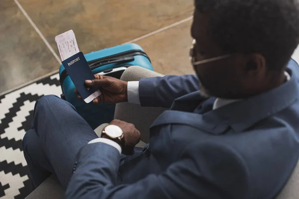 Man looking at watch