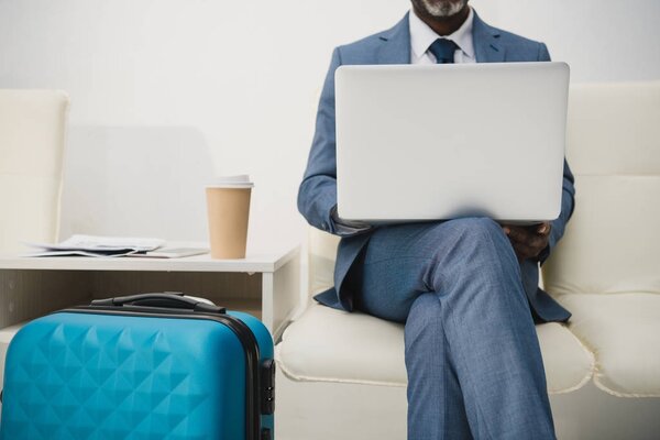 man working with laptop
