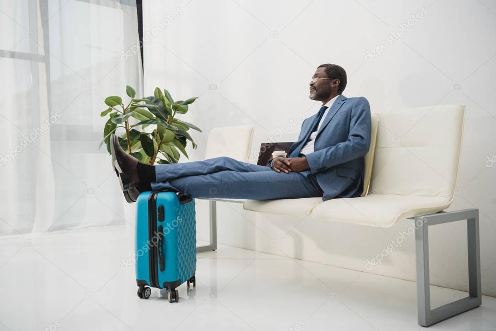 man waiting at the airport