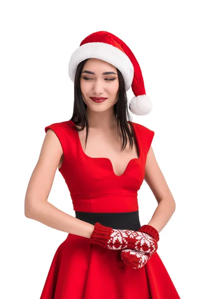 Asiatische Frau im Weihnachtsmann-Kostüm und Fäustlinge — kostenloses Stockfoto
