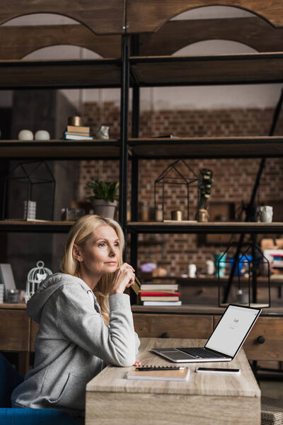 woman using laptop at home    