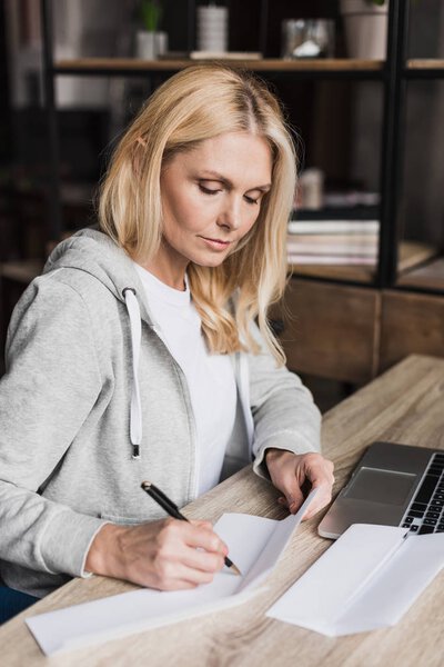 woman using laptop at home 
