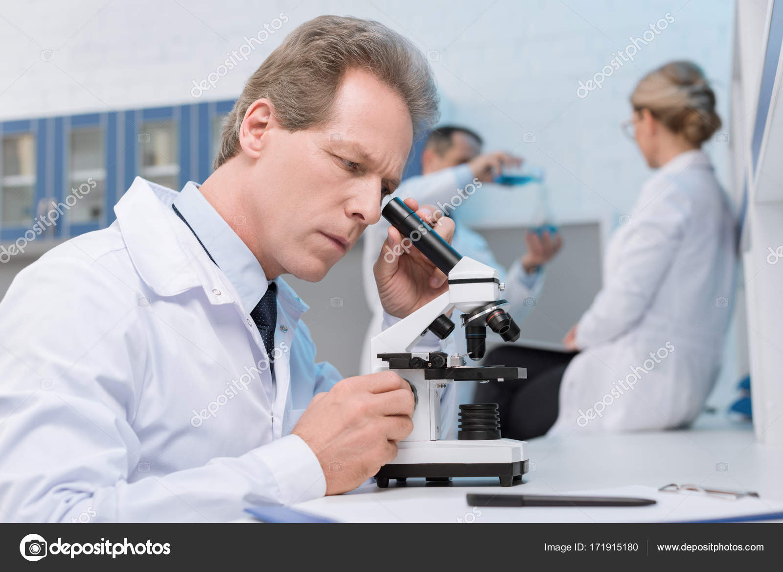 Scientist Working With Microscope Stock Photo Image By C Vitalikradko Scientist Working With Microscope Stock Photo Image By C Vitalikradko