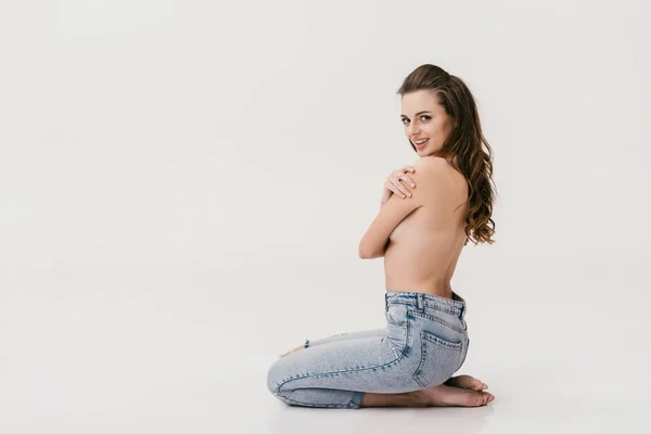 Polonahá dívka v džínách — Stock fotografie