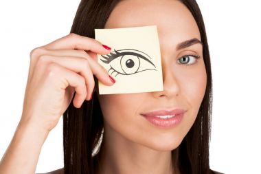 woman covering eye with sticker clipart