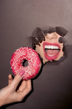 woman trying to bite donut clipart