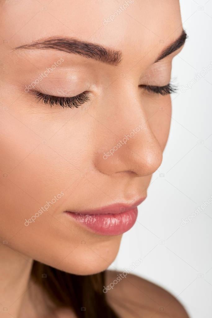 young woman with closed eyes