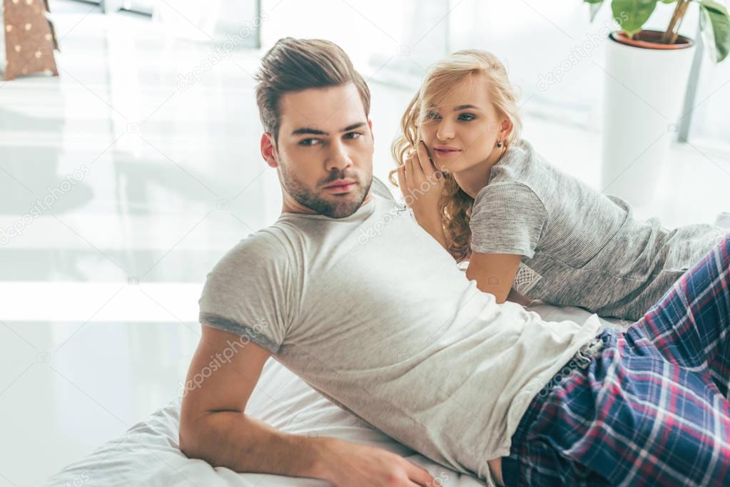 young couple in bedroom