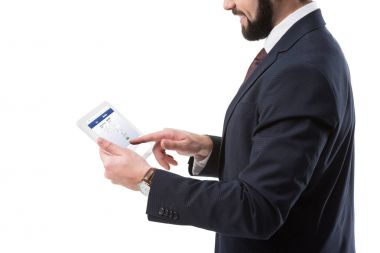 Facebook ile tablet ile işadamı