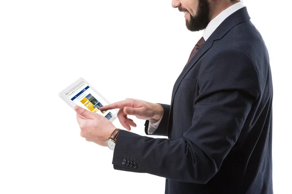Επιχειρηματίας με tablet με ενοίκιο την ιστοσελίδα — Φωτογραφία Αρχείου